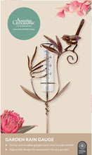 Load image into Gallery viewer, Garden rain gauge with decorative elements on a beige background, featuring Australian Geographic branding.