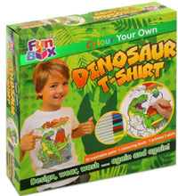 Load image into Gallery viewer, Box for 'Colour Your Own Dinosaur T-Shirt' craft kit with a child model and colorful design.
